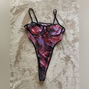 Two piece sheer bodysuit with pants.  Size small.